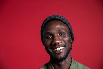 Young Black Man Smiling on Isolated Background