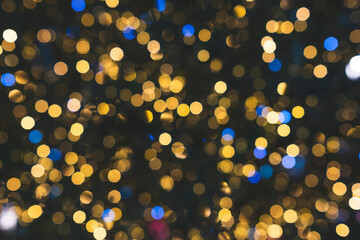 Fototapeta na wymiar Christmas decoration background, defocused lights glowing