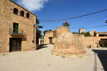 alls and source of the village of Palau-Sator, Baix Emporda, Girona province; Catalonia; Spain