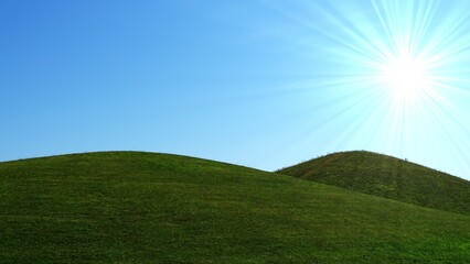 field and sky with sun