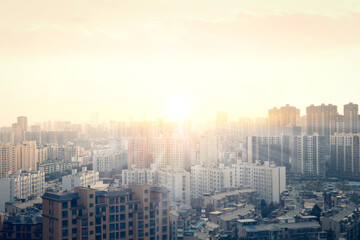 World Cities Day concept: city skyline at sunset background