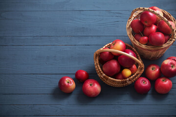 red apples on blue wooden background