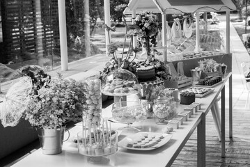 Special event in Latin American baby shower, decorations and high quality pastry in Guatemala on an interior table of a restaurant.