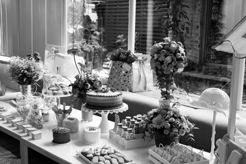 Special event in Latin American baby shower, decorations and high quality pastry in Guatemala on an interior table of a restaurant.