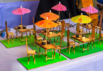 Table chair set made by bamboo are displayed for selling in handicraft fair.Selective focus.