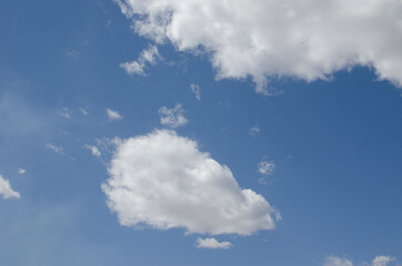 White clouds on a blue sky. Background.