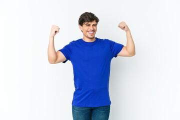 Fototapeta premium Young cool man cheering carefree and excited. Victory concept.