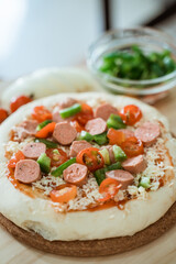 pizza served on the table with ingredients
