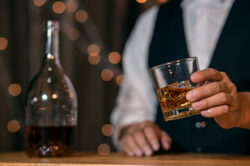 Barman pouring whiskey whiskey glass beautiful night