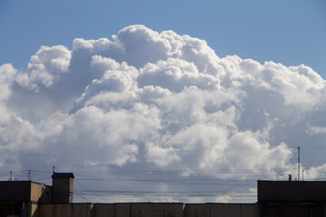 big white cloud on the roof of the house