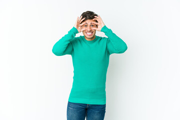 Fototapeta premium Young cool man keeping eyes opened to find a success opportunity.