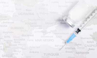 Conceptual image. Syringe with vaccine vial to protect from Covid-19 on the Map of russia, belarus, ukraine, latvia, estonia, covid-19 epidemic. Health and medical concept. To protect