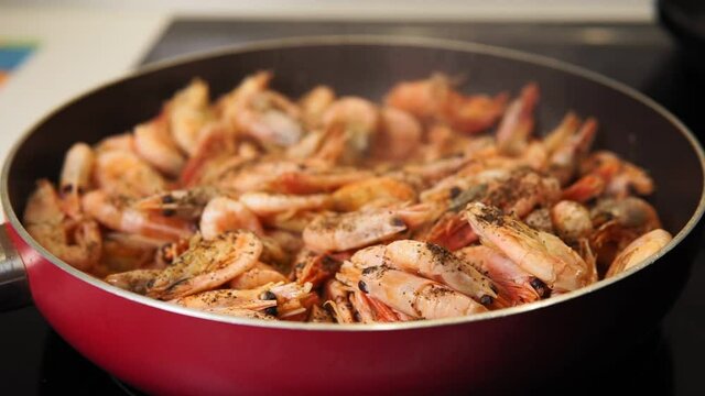 fried shrimp close-up with spices and lemon. selective focus. Sea food
