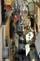 Fototapeta na wymiar alley among the crowded neighborhoods of Naples, Italy