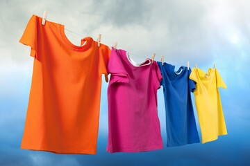 Wash colored clothes on a rope with clothespins