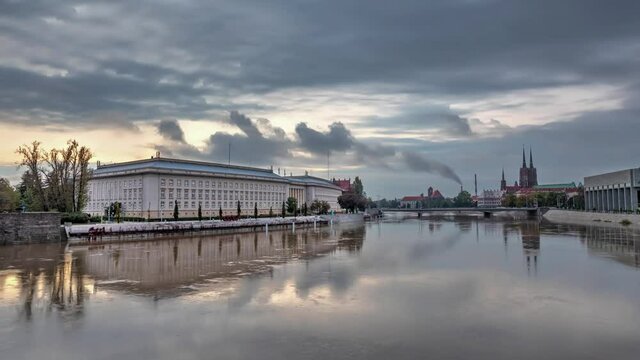 Wroclaw, Poland. View of Oder river and building of regional administration at dusk
