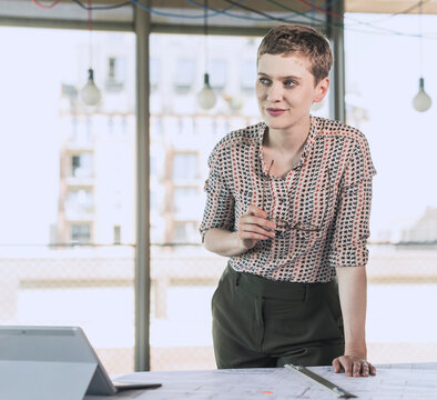 Thoughtful businesswoman in office