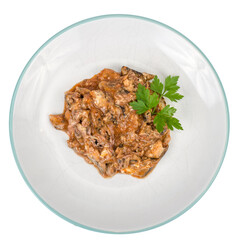 Plate with pieces of chopped canned fish in tomato sauce