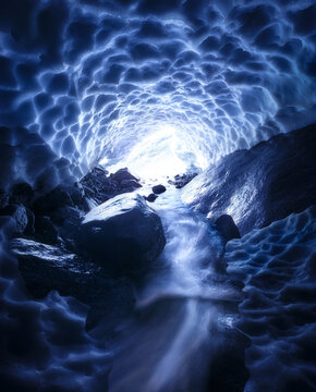 Creek flowing inside snow cave