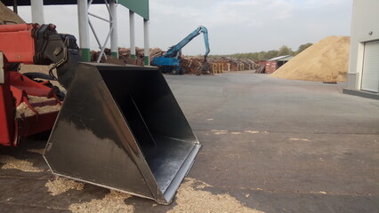 front loader works at a chip warehouse