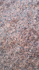 Fototapeta premium Red granite. Red granite texture. Background with vintage granite surface