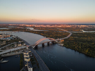 Aerial view of the big city at sunset