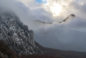 mount slope in a snow in a dense clouds