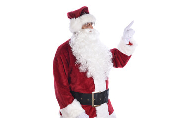 Side view of a senior man in traditional Santa Claus costume pointing with one hand. Isolated on white.