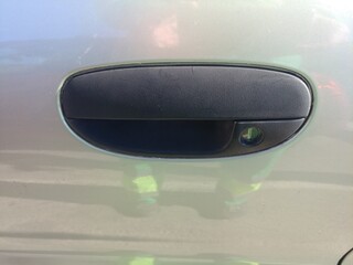 Obraz premium klamka samochodowa drzwi auto pojazd