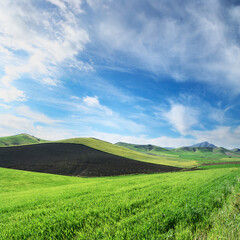 Hills Grass Land Below White Clouds And Blue Sky Of Sicily Countryside - 385822050