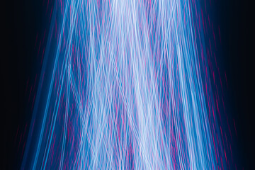 Blue light effects, straight and curved lines on dark backdrop. Abstraction neon light lines background