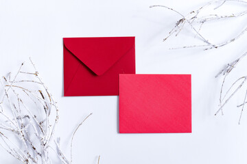 Christmas red blank mock-up letter with frost twigs.