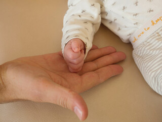 close up of a person holding a thermometer