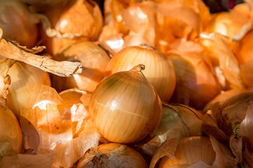 A display of Onions on a Market Stall