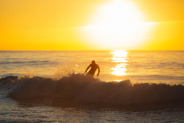 Surfer at end of wave