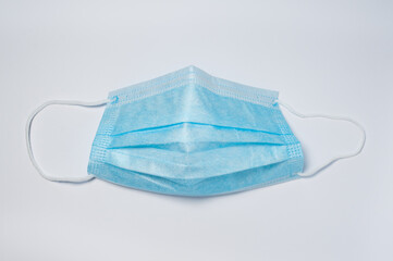 Medical protective face mask isolated on white background