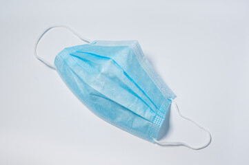 Medical protective face mask isolated on white background