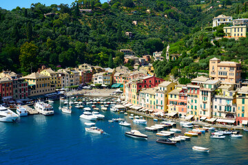 Fototapeta na wymiar Beautiful Portofino cityscape, best touristic Mediterranean place with typical colorful buildings and famous luxury harbor, Portofino, Liguria, Cinque Terre, Italy, Europe