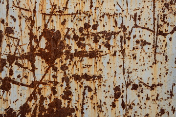 Interesting painted old metal surface with traces of rust, scratches and time damage texture