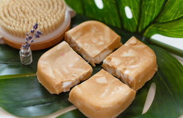 handmade soap made from squeezing soap slivers and brush, the concept of spa and self-care at home