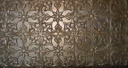 designer symmetrical fall ceiling pattern made of mud and plated with gold and silver