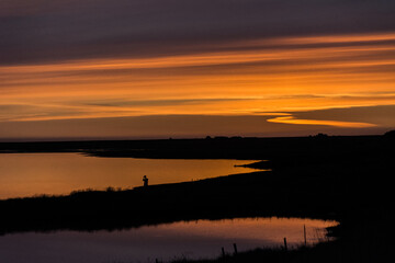 Taking a picture to the sunset in Iceland