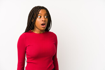 Young african american woman isolated being shocked because of something she has seen.