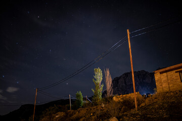 night landscape with mountains with stars