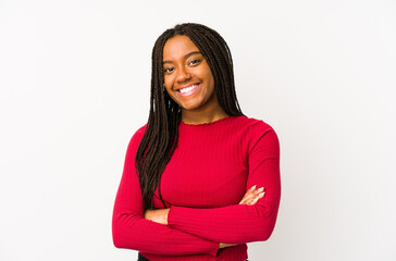 Obraz premium Young african american woman isolated who feels confident, crossing arms with determination.