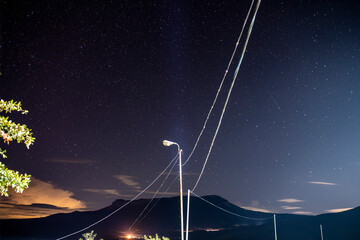 night landscape with mountains with stars