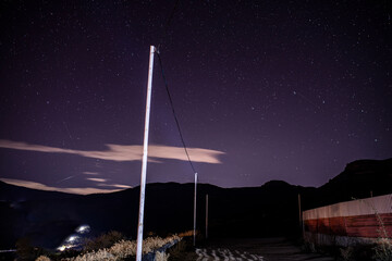 night landscape with mountains with stars