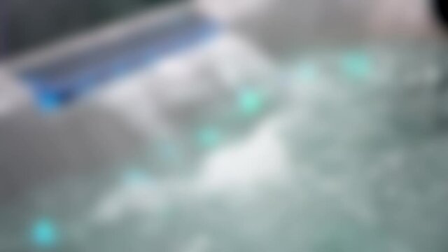 Blurred background. Sequence set jacuzzi waterfall bath with water close-up