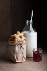 kurabie cookies with raspberry jam and milk