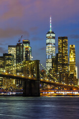 New York City skyline night Manhattan town Brooklyn Bridge World Trade Center portrait format